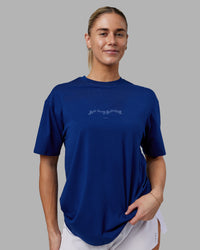 Woman wearing Just Run FLXCotton Oversized Tee - Midnight Blue-Light Blue | Model:Hannah | Size:XS | Thumbnail Index: 2