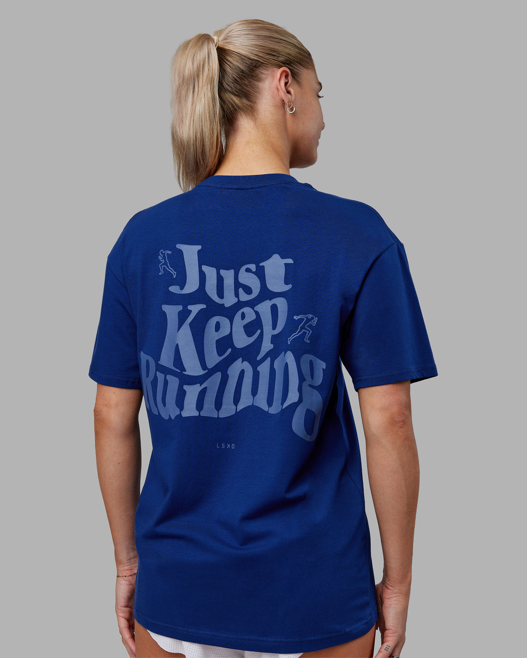Woman wearing Just Run FLXCotton Oversized Tee - Midnight Blue-Light Blue | Model:Hannah | Size:XS - view 7