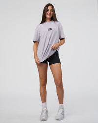 Woman wearing Kettle B FLXCotton Oversized Tee - Galactic Lilac-Black | Model:Estella | Size:XS | Thumbnail Index: 6