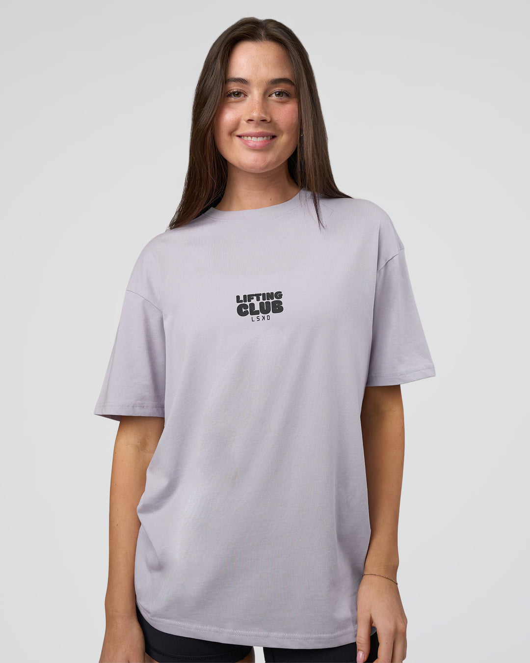 Woman wearing Kettle B FLXCotton Oversized Tee - Galactic Lilac-Black | Model:Estella | Size:XS - view 4