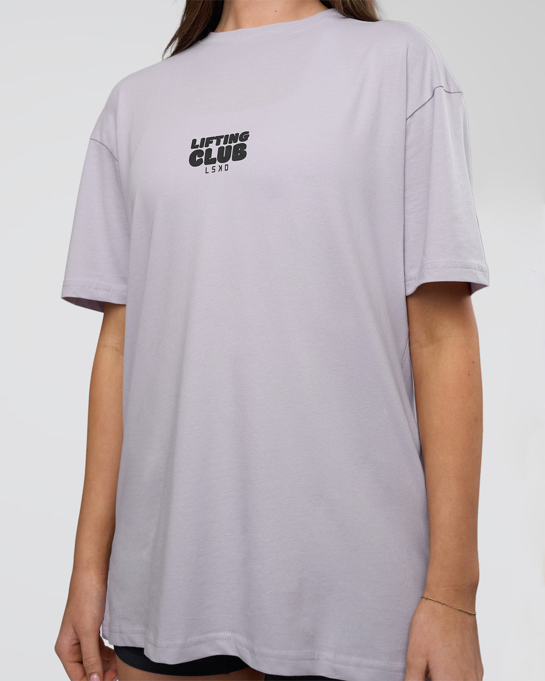 Woman wearing Kettle B FLXCotton Oversized Tee - Galactic Lilac-Black | Model:Estella | Size:XS - view 9