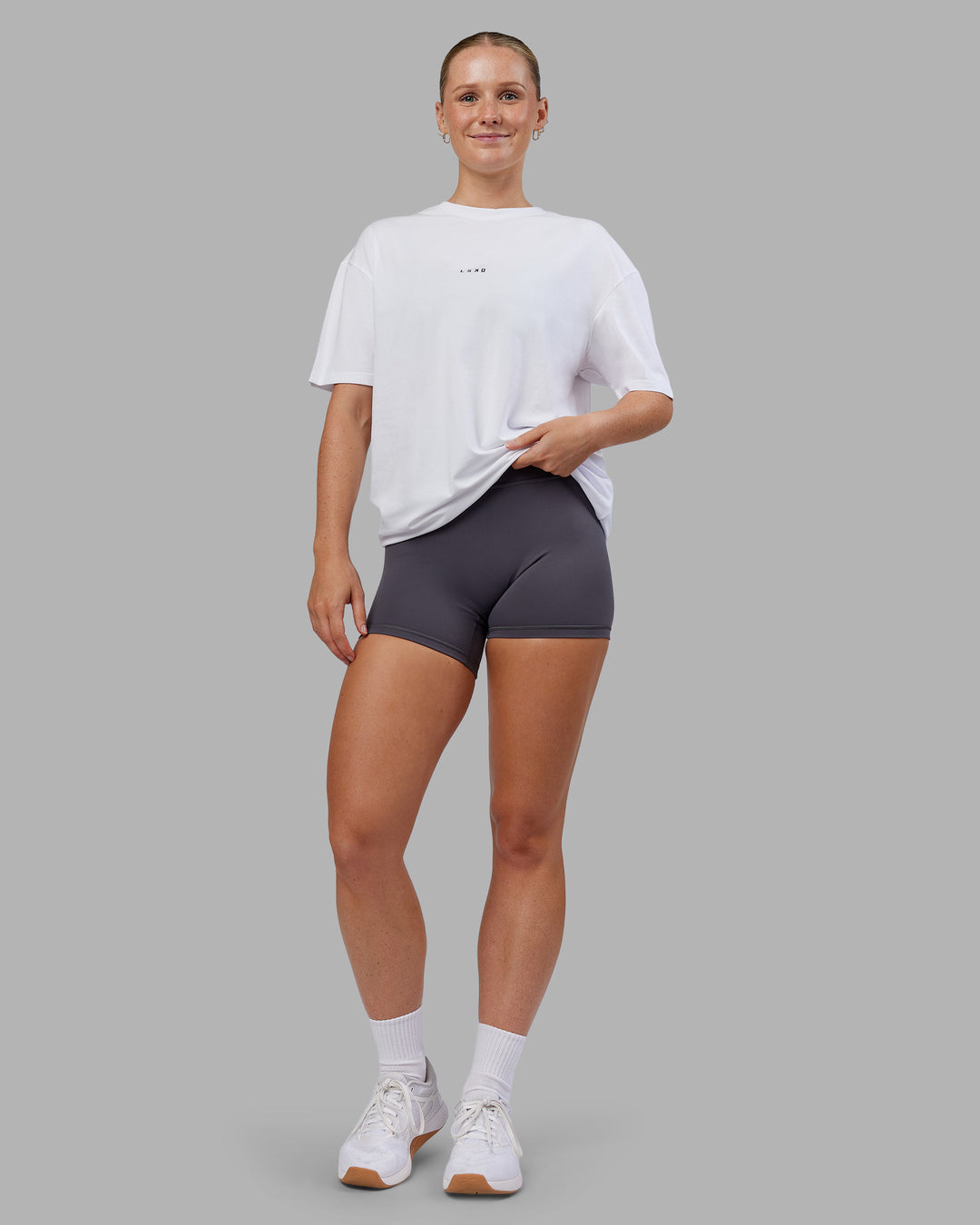 Woman wearing Kettlebell FLXCotton Oversized Tee - White-Black | Model:Neve | Size:XS - view 5