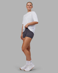 Woman wearing Kettlebell FLXCotton Oversized Tee - White-Black | Model:Neve | Size:XS | Thumbnail Index: 10