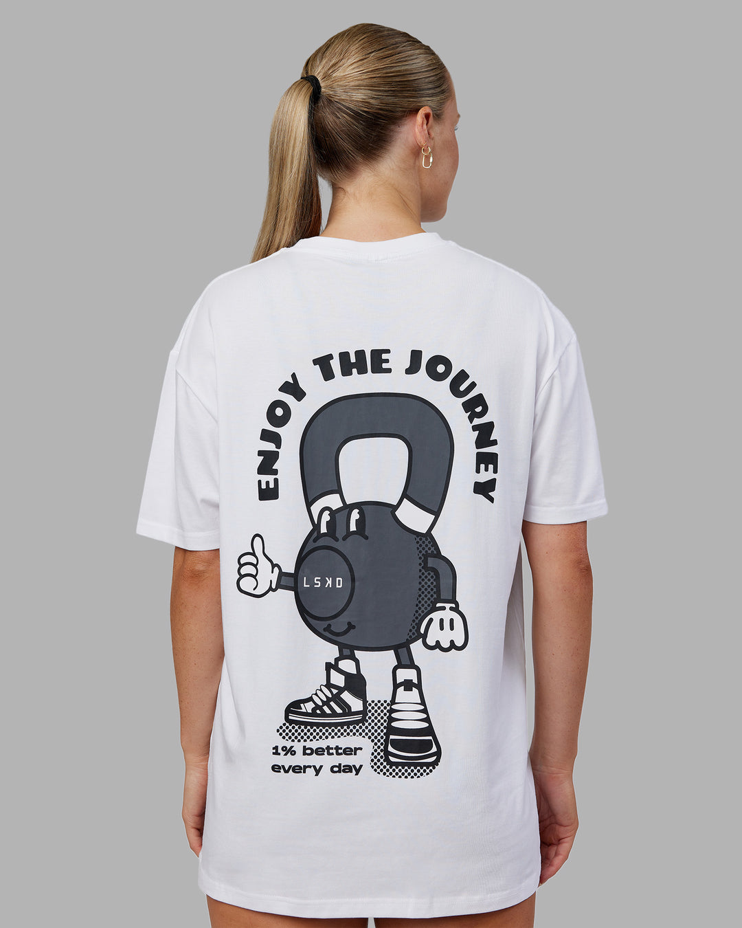 Woman wearing Kettlebell FLXCotton Oversized Tee - White-Black | Model:Neve | Size:XS - view 7