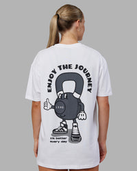 Woman wearing Kettlebell FLXCotton Oversized Tee - White-Black | Model:Neve | Size:XS | Thumbnail Index: 6