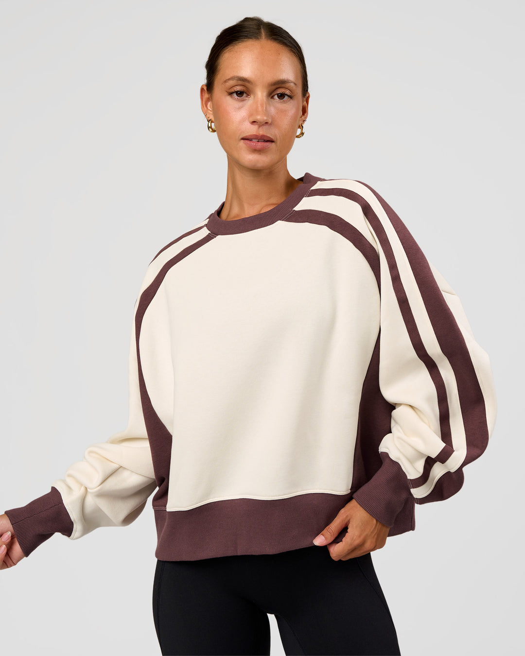 Woman wearing LSKD Fitness Club Oversized Sweater - Off White-Cocoa Powder | Model:Brylee | Size:XS - view 2