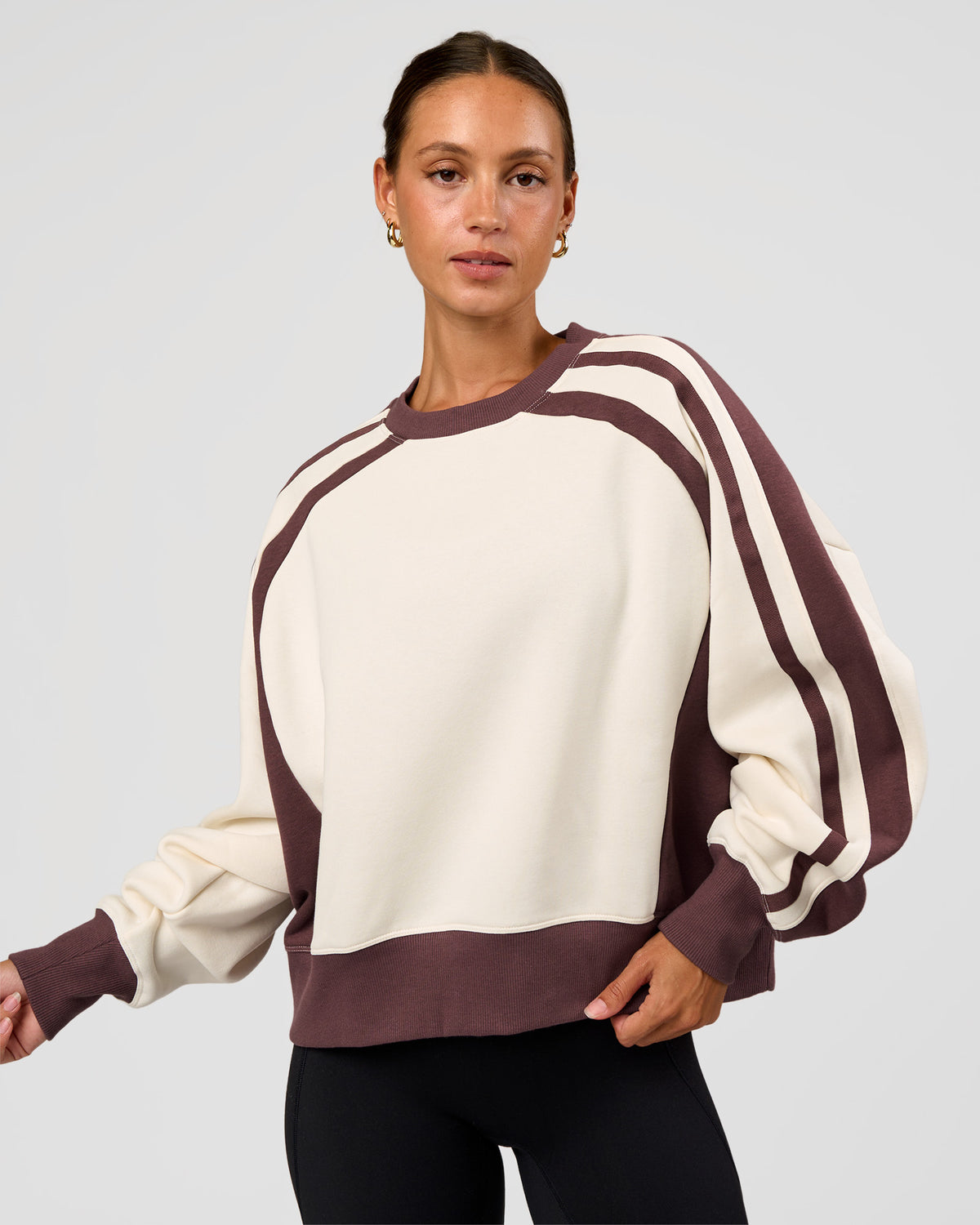 Woman wearing LSKD Fitness Club Oversized Sweater - Off White-Cocoa Powder | Model:Brylee | Size:XS