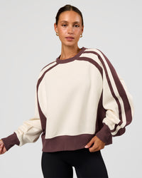 Woman wearing LSKD Fitness Club Oversized Sweater - Off White-Cocoa Powder | Model:Brylee | Size:XS | Thumbnail Index: 1