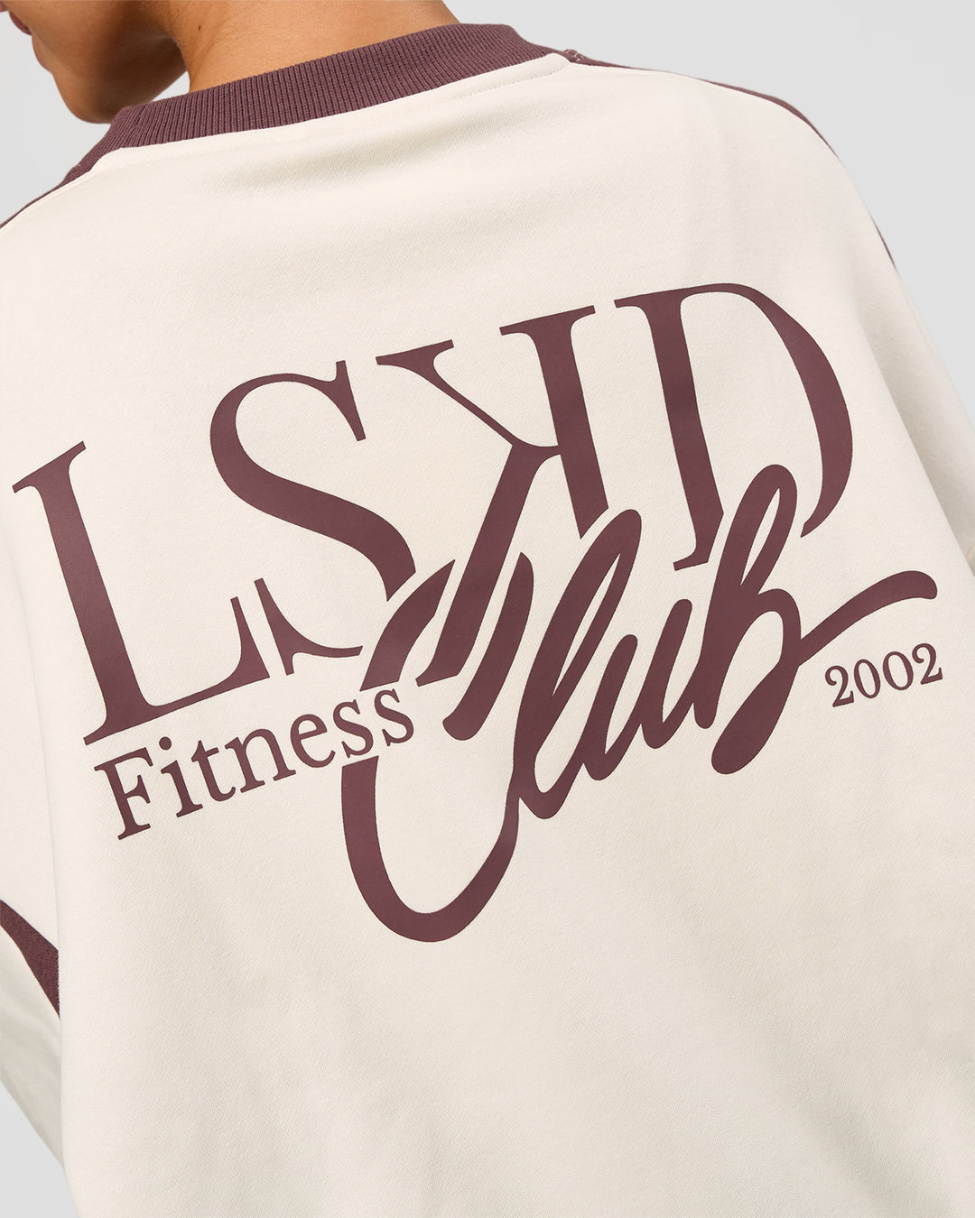 Woman wearing LSKD Fitness Club Oversized Sweater - Off White-Cocoa Powder | Model:Brylee | Size:XS - view 7