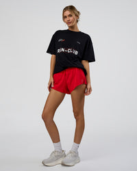 Woman wearing LSKD Run Club FLXCotton Oversized Tee - Black-White | Model:Leilani | Size:XS | Thumbnail Index: 3