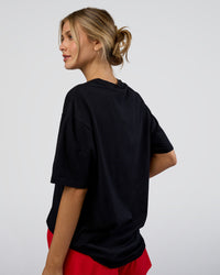 Woman wearing LSKD Run Club FLXCotton Oversized Tee - Black-White | Model:Leilani | Size:XS | Thumbnail Index: 5