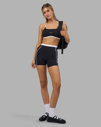 Woman wearing Liberate Contrast High-Rise 4" Short Pockets - Black-White | Model:Leilani | Size:XS | Thumbnail Index: 6