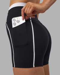 Woman wearing Liberate Contrast High-Rise 4" Short Pockets - Black-White | Model:Leilani | Size:XS | Thumbnail Index: 5