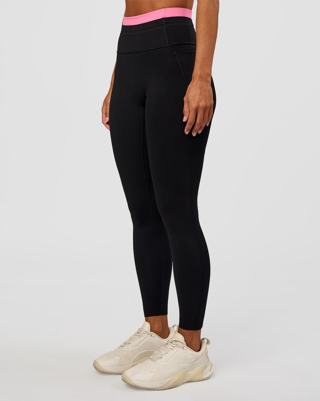 Woman wearing Liberate High-Rise Full Length Legging Pockets - Black-Candy Pink | Model:Brylee | Size:XS - view 1