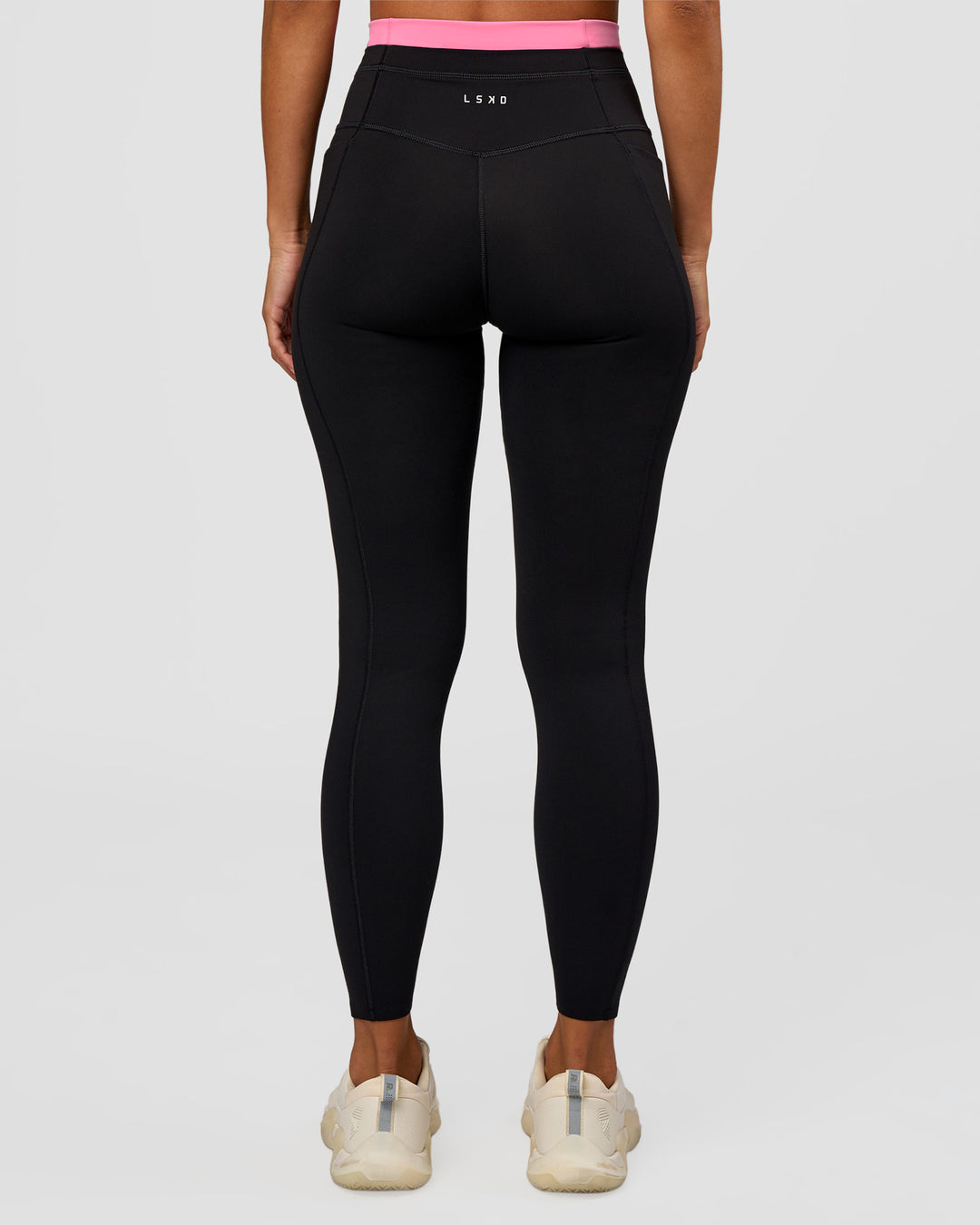 Woman wearing Liberate High-Rise Full Length Legging Pockets - Black-Candy Pink | Model:Brylee | Size:XS - view 4