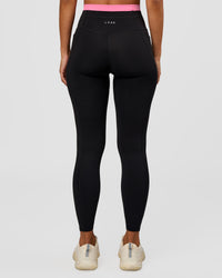 Woman wearing Liberate High-Rise Full Length Legging Pockets - Black-Candy Pink | Model:Brylee | Size:XS | Thumbnail Index: 3