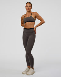 Woman wearing Liberate High-Rise Full Length Legging Pockets in Duskstone-Black | Model:Maja | Size:XS | Thumbnail Index: 3