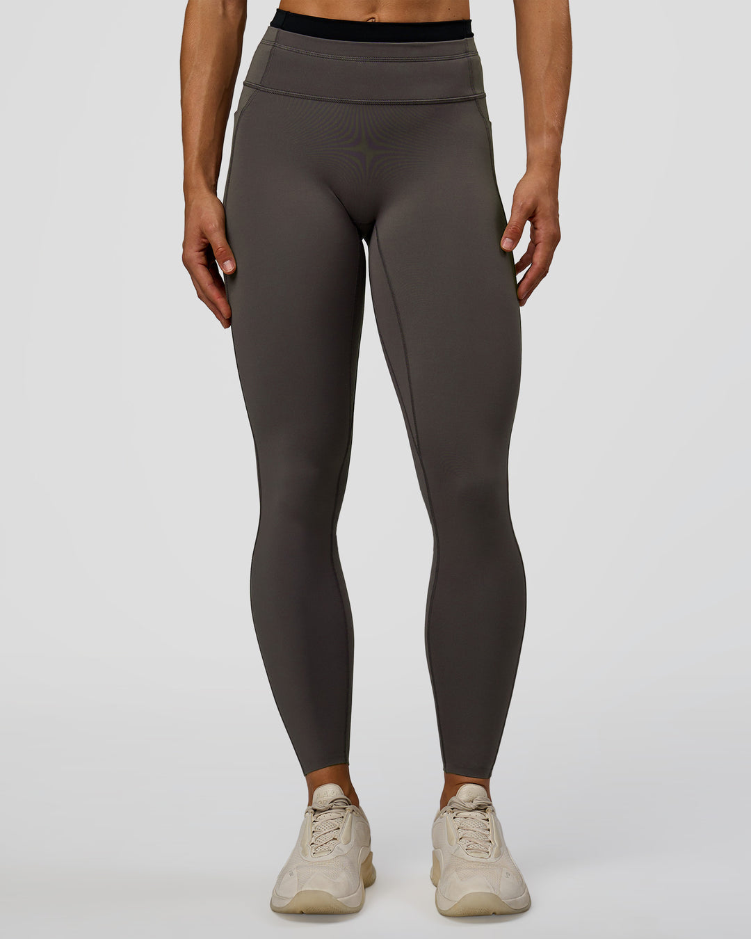 Woman wearing Liberate High-Rise Full Length Legging Pockets in Duskstone-Black | Model:Maja | Size:XS - view 3