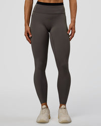 Woman wearing Liberate High-Rise Full Length Legging Pockets in Duskstone-Black | Model:Maja | Size:XS | Thumbnail Index: 2