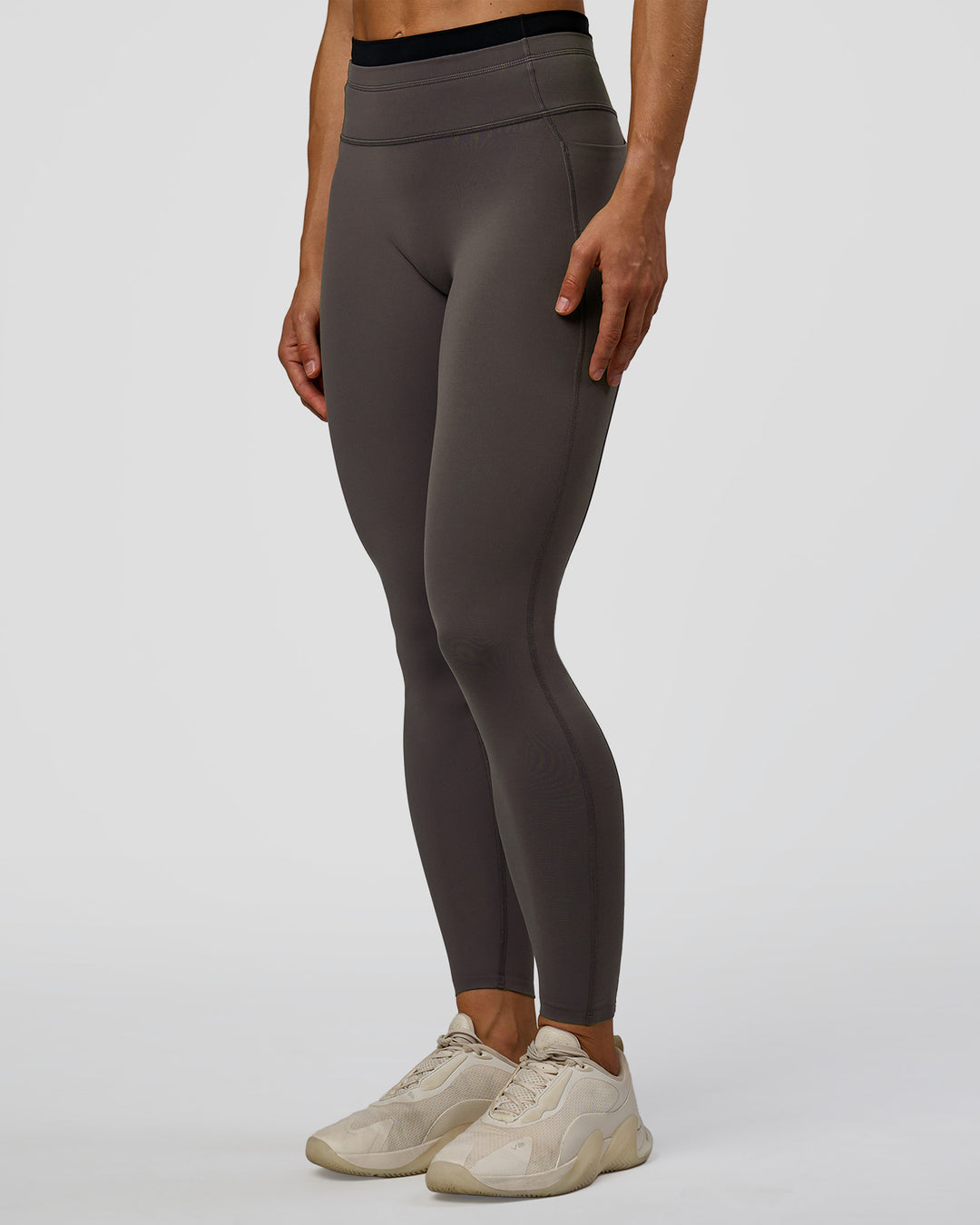 Woman wearing Liberate High-Rise Full Length Legging Pockets in Duskstone-Black | Model:Maja | Size:XS - view 5