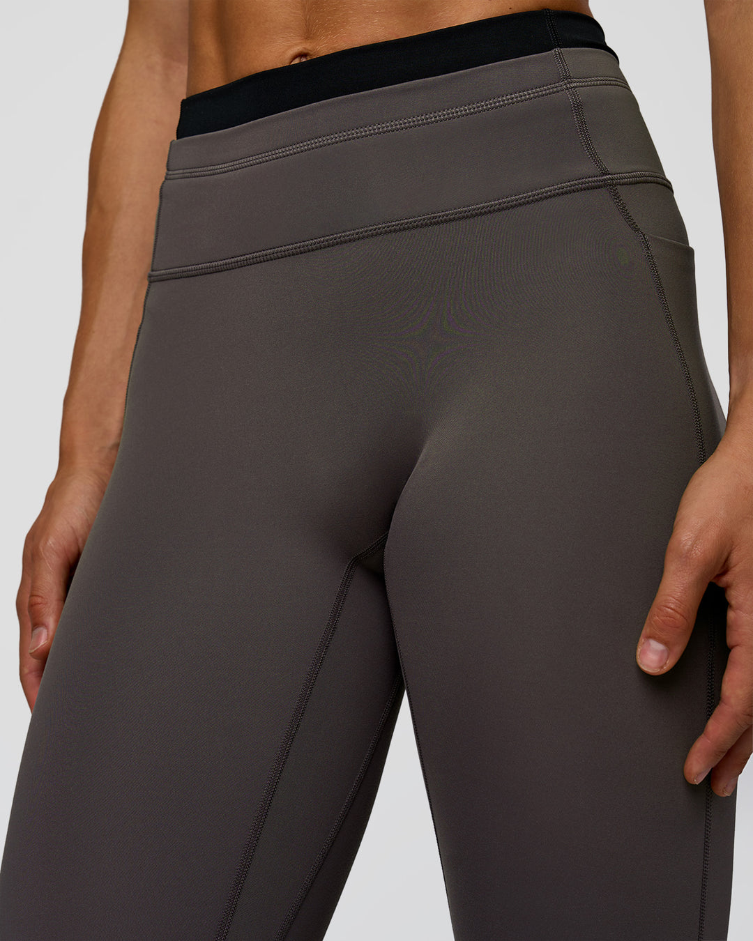 Woman wearing Liberate High-Rise Full Length Legging Pockets in Duskstone-Black | Model:Maja | Size:XS - view 6