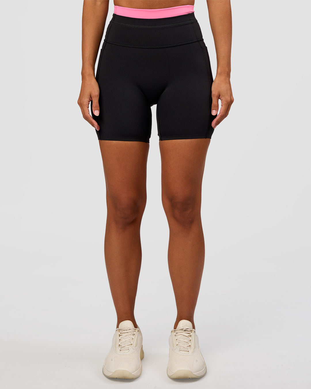 Woman wearing Liberate High-Rise 6" Short Pockets - Black-Candy Pink | Model:Brylee | Size:XS - view 5
