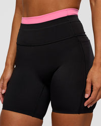 Woman wearing Liberate High-Rise 6" Short Pockets - Black-Candy Pink | Model:Brylee | Size:XS | Thumbnail Index: 6
