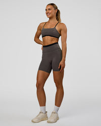 Woman wearing Liberate High-Rise 6" Short Pockets in Duskstone-Black | Model:Maja | Size:XS | Thumbnail Index: 3