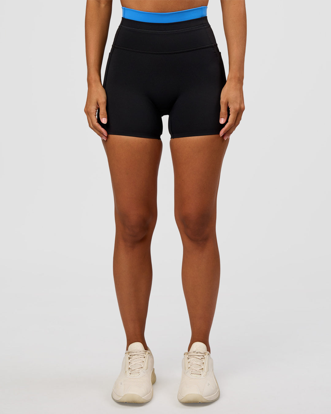 Woman wearing Liberate High-Rise 4" Short Pockets - Black-Palace Blue | Model:Brylee | Size:XS - view 5