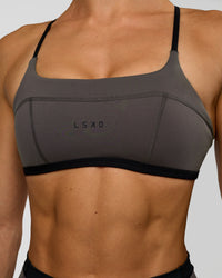Woman wearing Liberate Sports Bra in Duskstone-Black | Model:Maja | Size:XS | Thumbnail Index: 2