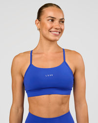 Woman wearing Lift Sports Bra - Electric Indigo | Model:Maja | Size:XS | Thumbnail Index: 3
