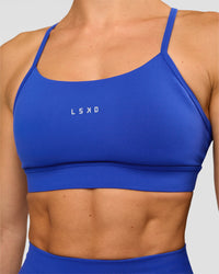 Woman wearing Lift Sports Bra - Electric Indigo | Model:Maja | Size:XS | Thumbnail Index: 7