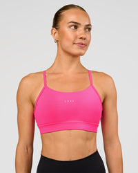 Woman wearing Lift Sports Bra - Ultra Pink | Model:Maja | Size:XS | Thumbnail Index: 0