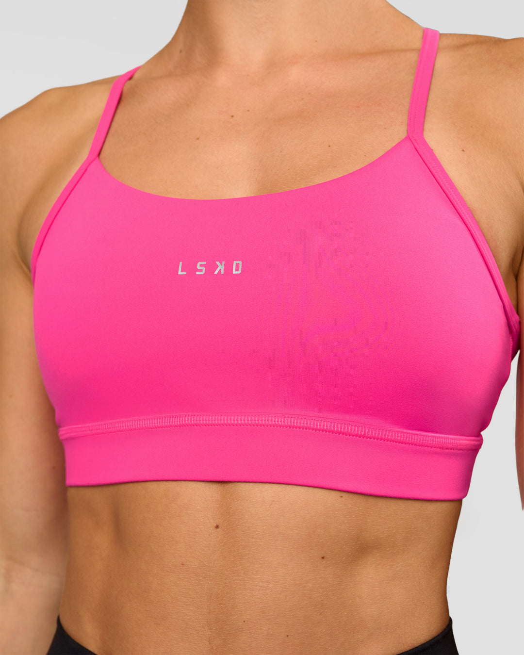 Woman wearing Lift Sports Bra - Ultra Pink | Model:Maja | Size:XS - view 6