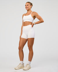 Woman wearing Lift Sports Bra - White | Model:Maja | Size:XS | Thumbnail Index: 2