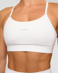 Woman wearing Lift Sports Bra - White | Model:Maja | Size:XS | Thumbnail Index: 3