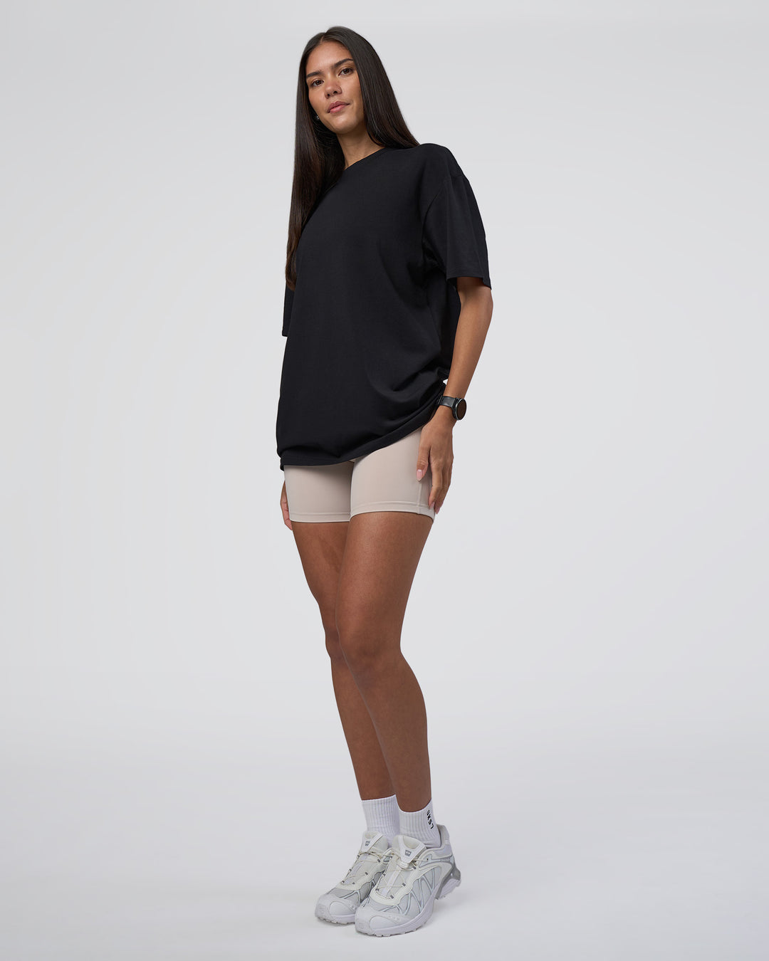 Woman wearing Lifting Club FLXCotton Tee Oversize - Black-Black | Model:Rhiley | Size:XS - view 11