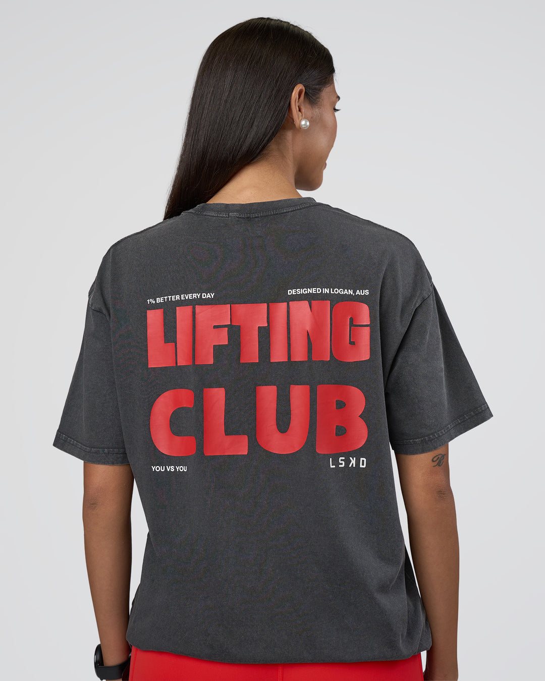 Woman wearing Lifting FLXCotton Oversized Tee - Black Washed-Flame | Model:Rhiley | Size:XS - view 4