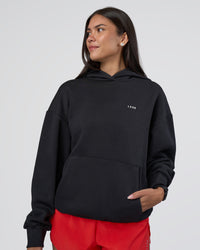 Woman wearing Lifting Unisex Oversized Hoodie - Black-Flame| Model:Rhiley | Size:XS | Thumbnail Index: 4