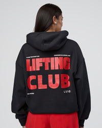 Woman wearing Lifting Unisex Oversized Hoodie - Black-Flame| Model:Rhiley | Size:XS | Thumbnail Index: 3