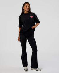 Woman wearing Love the Journey FLXCotton Oversized Tee - Black-Flame | Model:Bianca | Size:XS | Thumbnail Index: 10