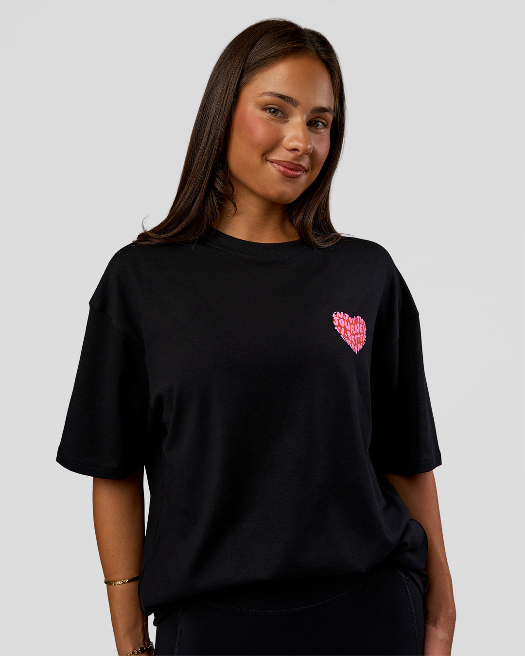 Woman wearing Love the Journey FLXCotton Oversized Tee - Black-Flame | Model:Bianca | Size:XS - view 5
