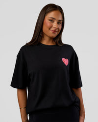 Woman wearing Love the Journey FLXCotton Oversized Tee - Black-Flame | Model:Bianca | Size:XS | Thumbnail Index: 4