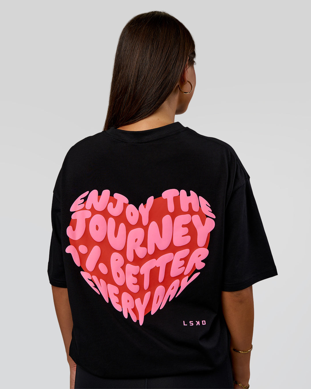 Woman wearing Love the Journey FLXCotton Oversized Tee - Black-Flame | Model:Bianca | Size:XS - view 4