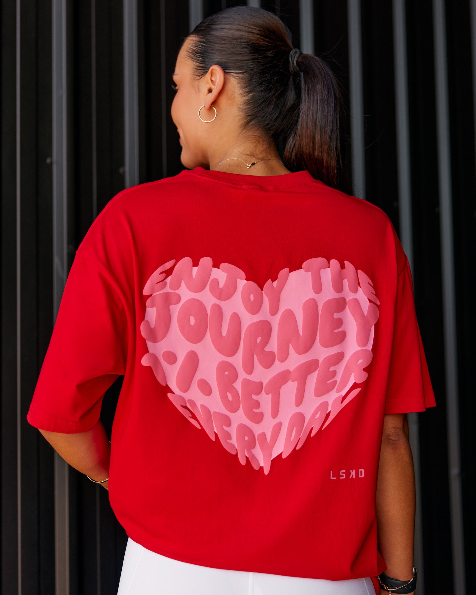 Woman wearing Love the Journey FLXCotton Oversized Tee - Flame-Candy Pink | Model:Shae | Size:XS