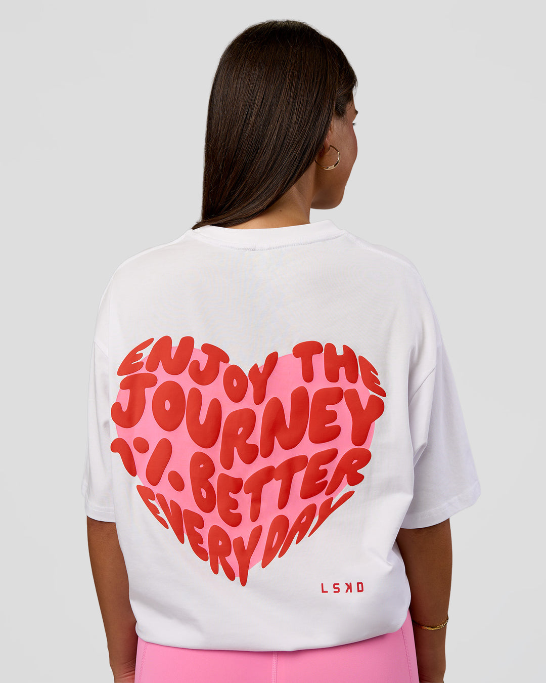 Woman wearing Love the Journey FLXCotton Oversized Tee - White-Candy Pink | Model:Bianca | Size:XS - view 13