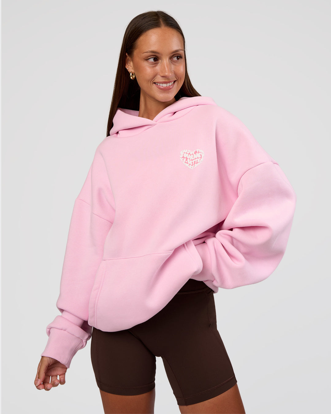 Woman wearing Love The Journey Unisex Oversized Hoodie - Marshmallow-White | Model:Brylee | Size:XS - view 4