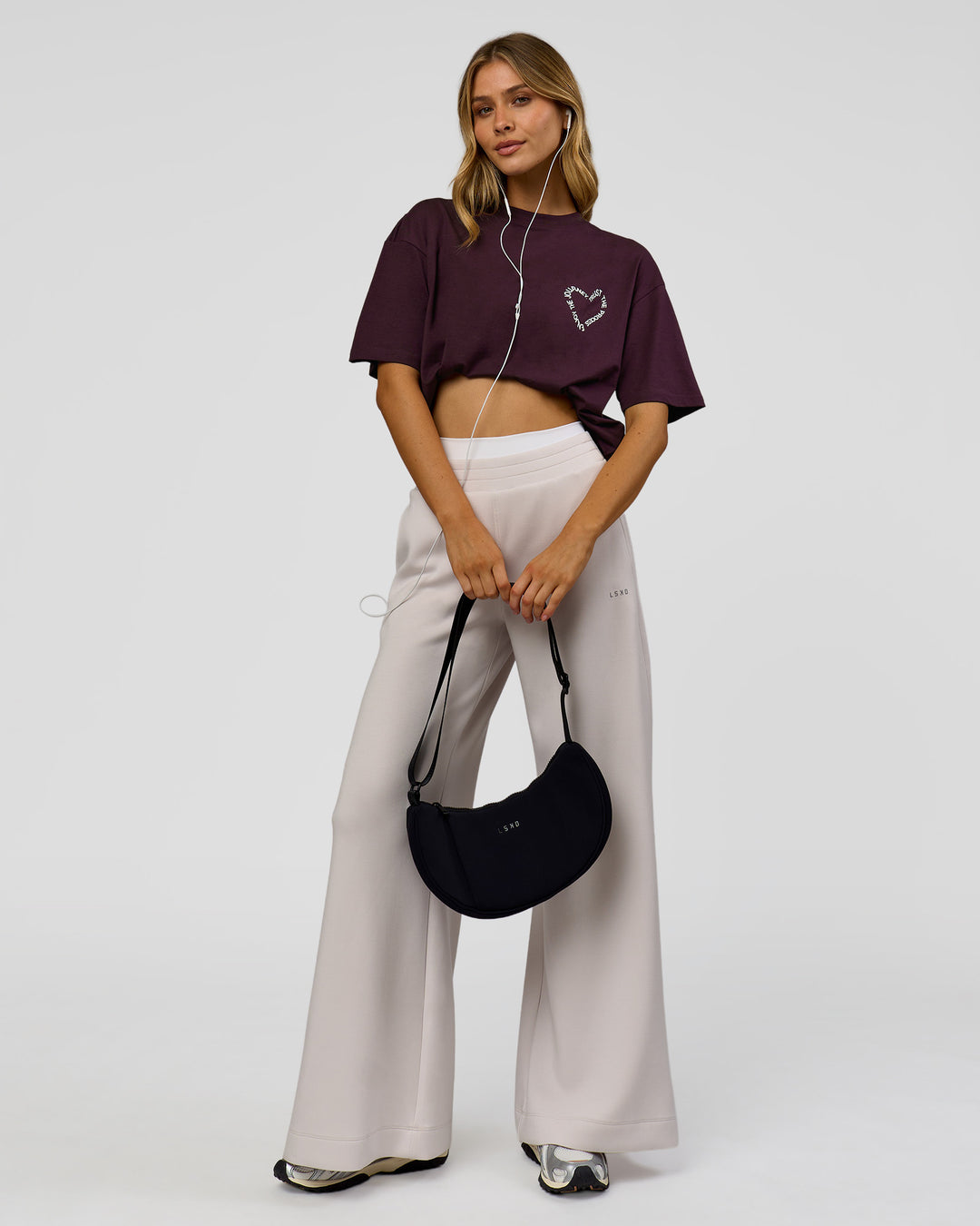 Woman wearing Love The Process FLXCotton Oversize Tee - Midnight Plum-White | Model:Leilani | Size:XS - view 10