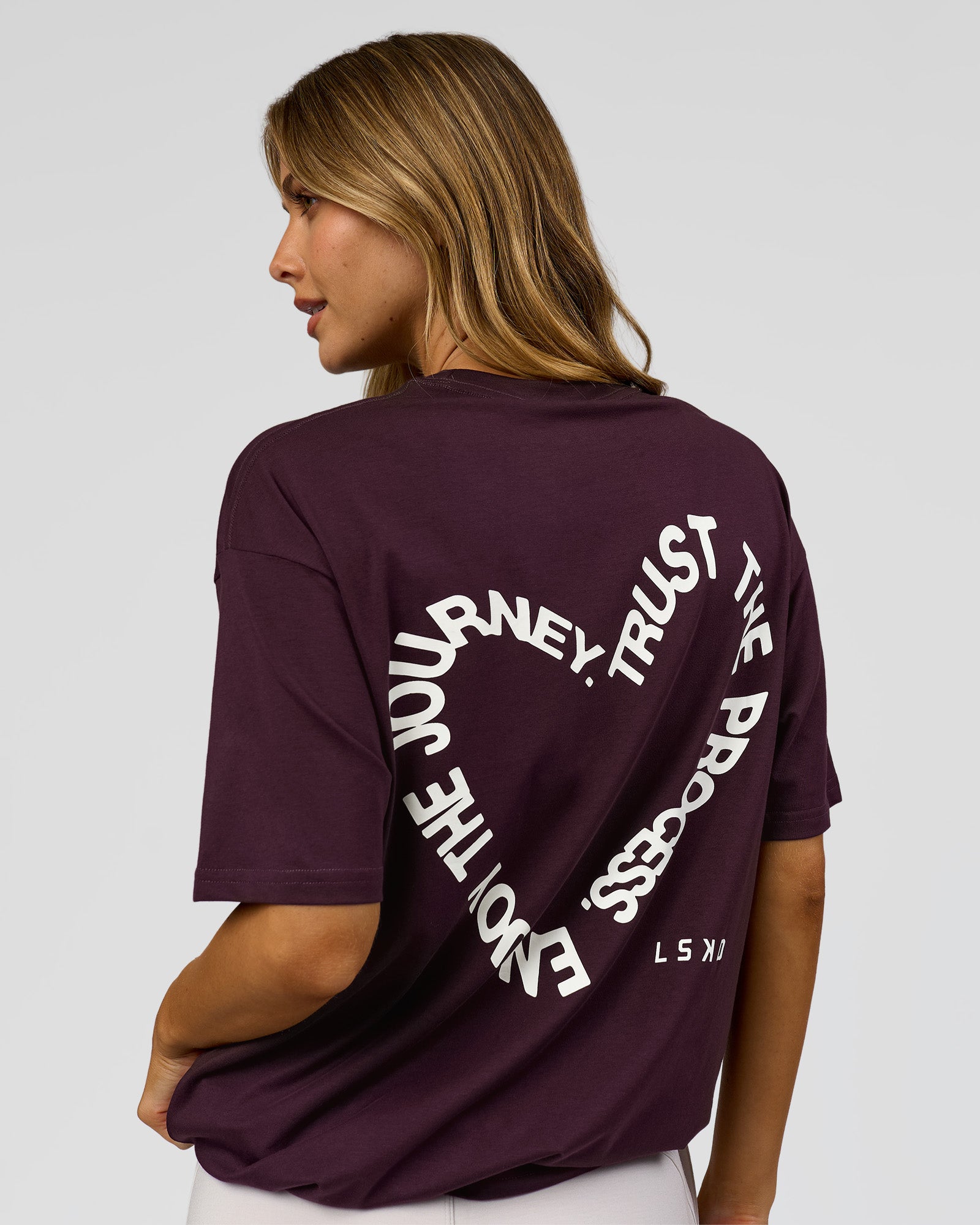 Woman wearing Love The Process FLXCotton Oversize Tee - Midnight Plum-White | Model:Leilani | Size:XS