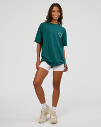 Woman wearing Love The Process FLXCotton Oversize Tee - Transformative Teal-Marshmallow | Model:Dakota | Size:XS | Thumbnail Index: 10